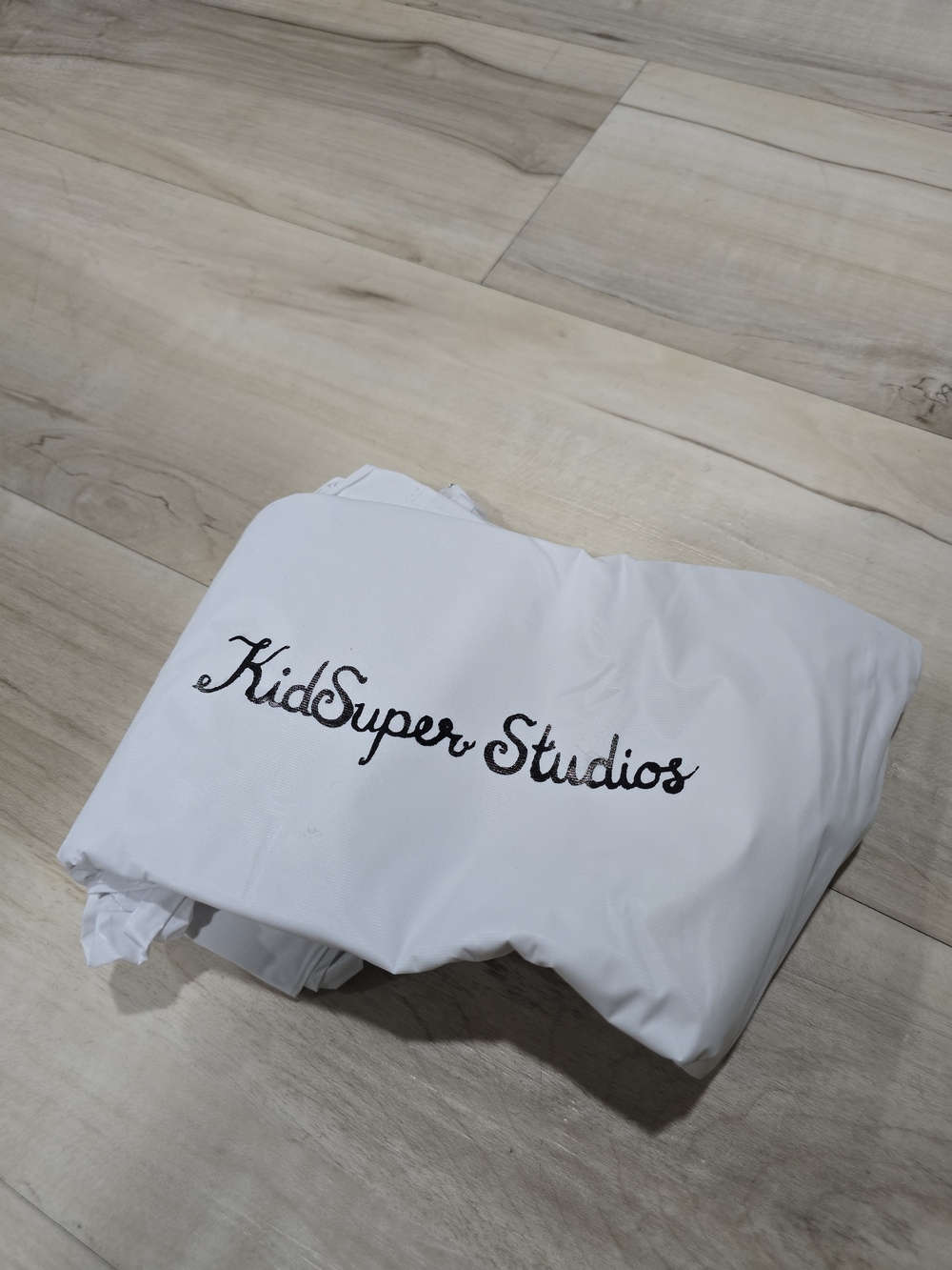 KidSuper Studios White Rain Poncho Black Printed Logo X White Poncho